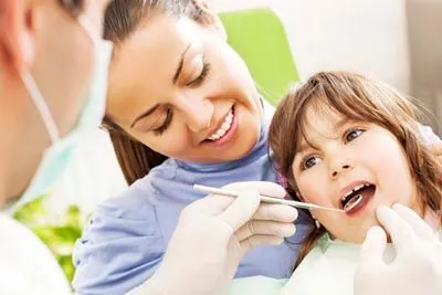 young patient receiving emergency dental care after having a toothache